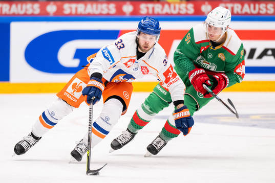 Veli Matti Vittasmäki of Tappara and Adam Tambellini of