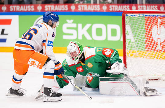 Philip Granath of Tappara against goalkeeper Calle Clang of