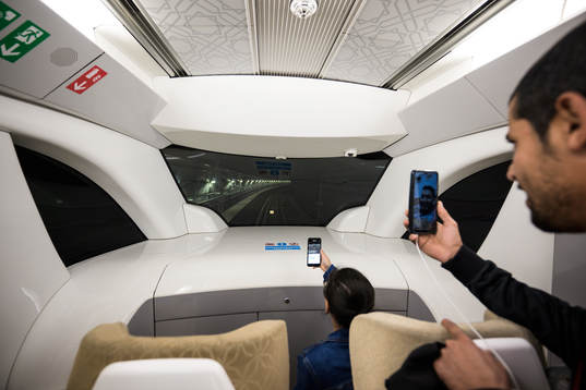 Passengers travel in a Gold car