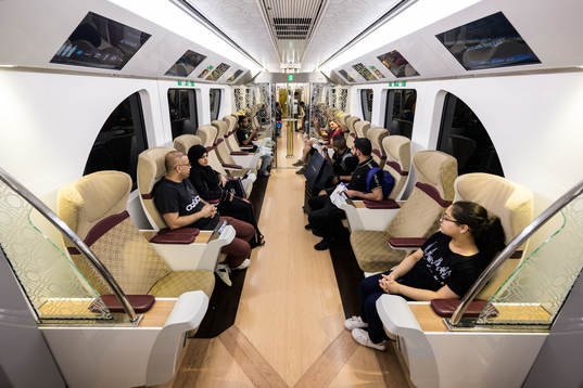 Passengers travel in a Gold car