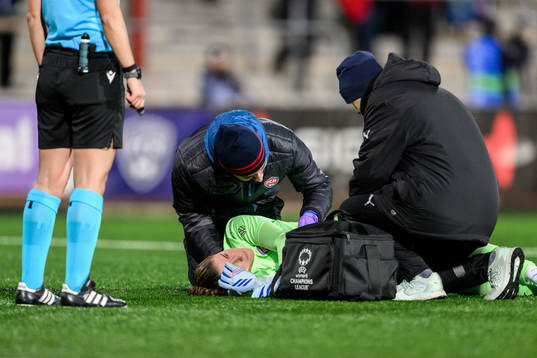 goalkeeper Teagan Micah of Rosengård in pain
