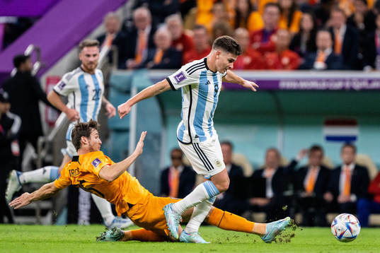 Marten de Roon of Netherlands and Julian Alvarez of