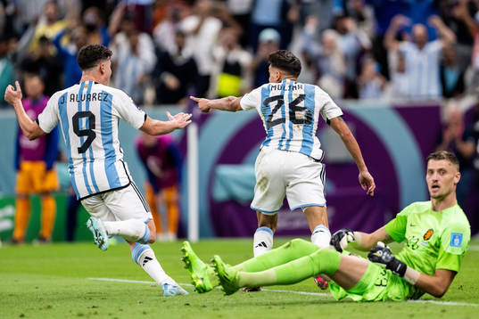 Julian Alvarez and Nahuel Molina of Argentina celebrate the