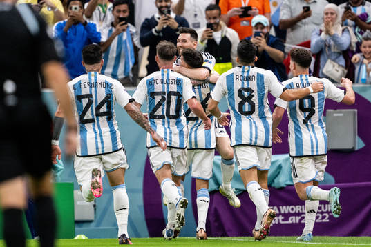 Lionel Messi and Nahuel Molina of Argentina celebrate the