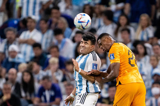 Marcos Acuna of Argentina and Denzel Dumfries of Netherlands