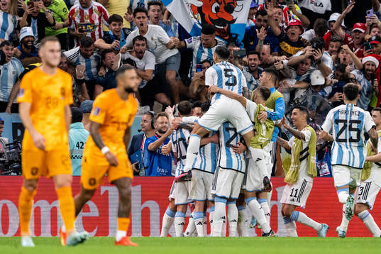 Lionel Messi of Argentina celebrate with team mates