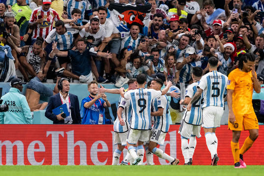 Lionel Messi of Argentina celebrate with team mates
