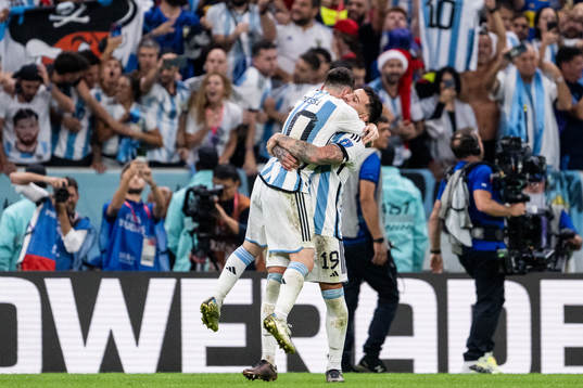 Lionel Messi of Argentina celebrate with Nicolas Otamendi