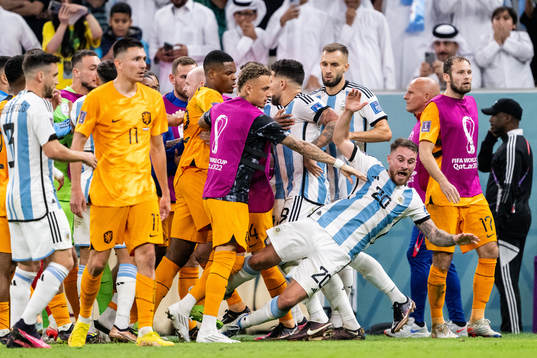 Alexis Mac Allister of Argentina falls as players of