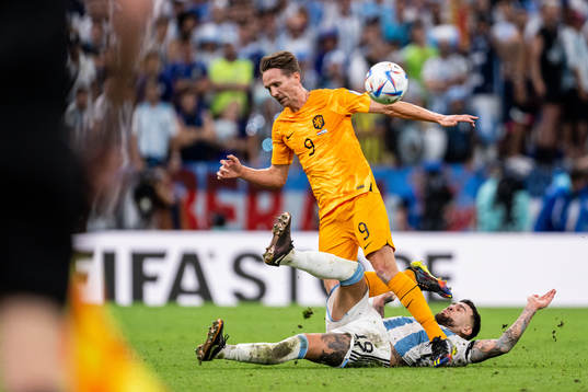 Luuk de Jong of Netherlands and Nicolas Otamendi of