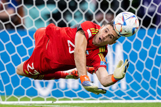 Goalkeeper Emiliano Martinez of Argentina saves