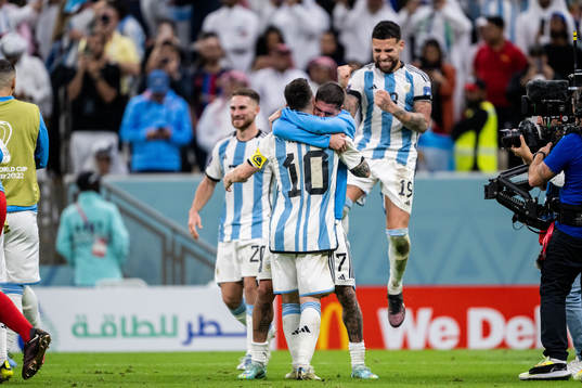 Lionel Messi, Rodrigo de Paul and Nicolas Otamendi of