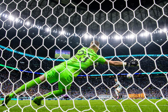 Leandro Paredes of Argentina scores at penalty shootout