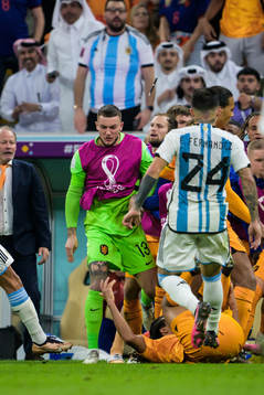 A pen is thrown onto the pitch as players of Netherlands