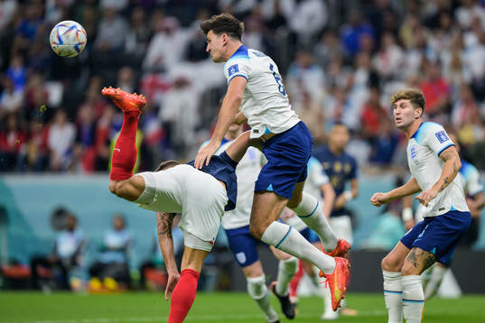 Harry Maguire of England and Olivier Giroud of France