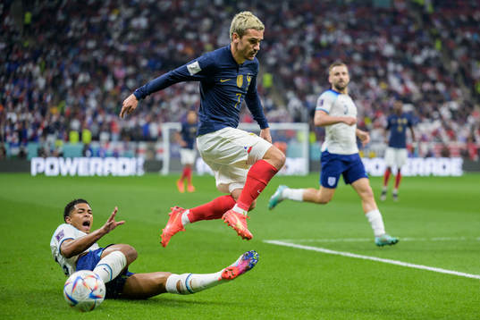 Jude Bellingham of England and Antoine Griezmann of France