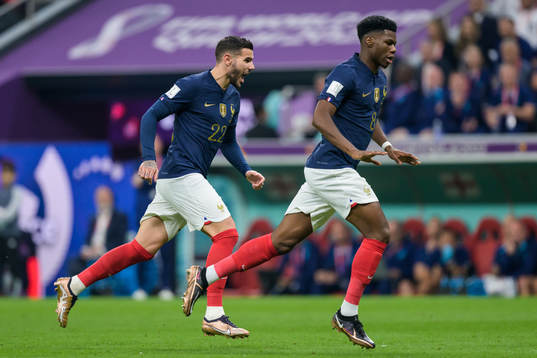 Theo Hernandez and Aurelien Tchouameni of France celebrate