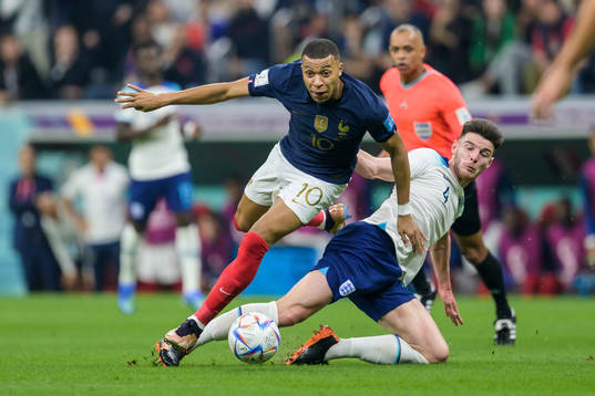 Kylian Mbappe of France and Declan Rice of England