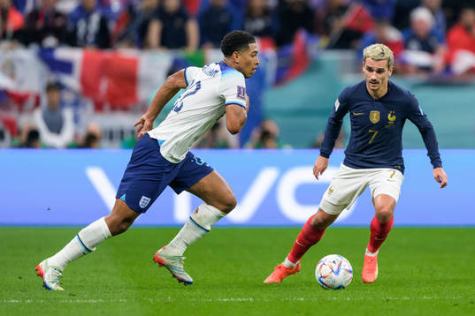 Jude Bellingham of England and Antoine Griezmann of France