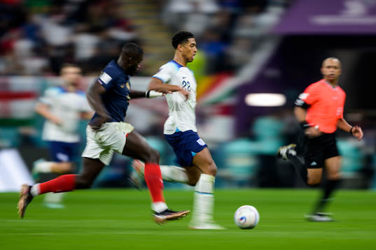 Dayot Upamecano of France and Jude Bellingham of England