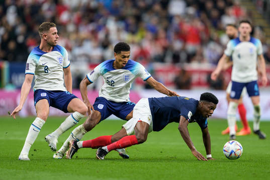 Jordan Henderson and Jude Bellingham of England against