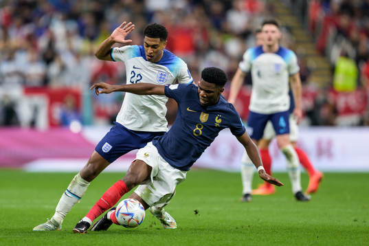 Jude Bellingham of England and Aurelien Tchouameni of France