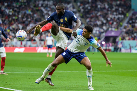 Dayot Upamecano of France and Jude Bellingham of England