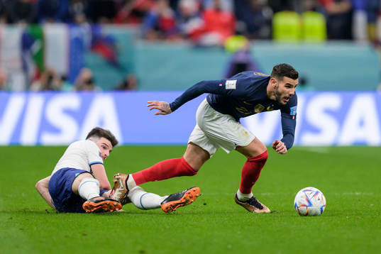 Declan Rice of England and Theo Hernandez of France