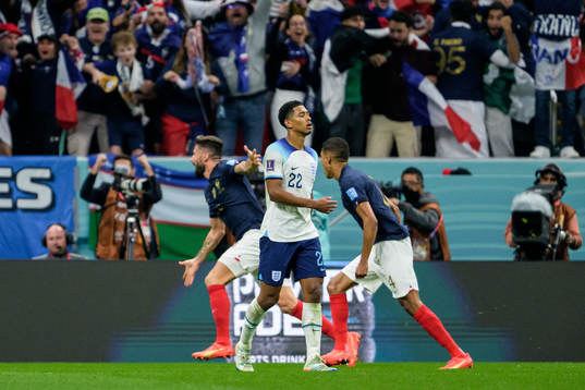 Jude Bellingham of England looks dejected as Olivier Giroud