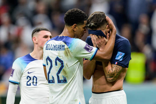 Jude Bellingham of England and Olivier Giroud of France