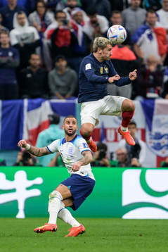 Kyle Walker of England and Antoine Griezmann of France