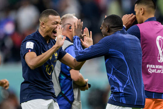 Kylian Mbappe and Ousmane Dembele of France celebrate