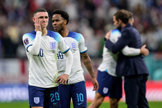 Phil Foden and Raheem Sterling of England