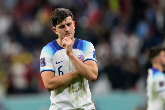 Harry Maguire of England looks dejected