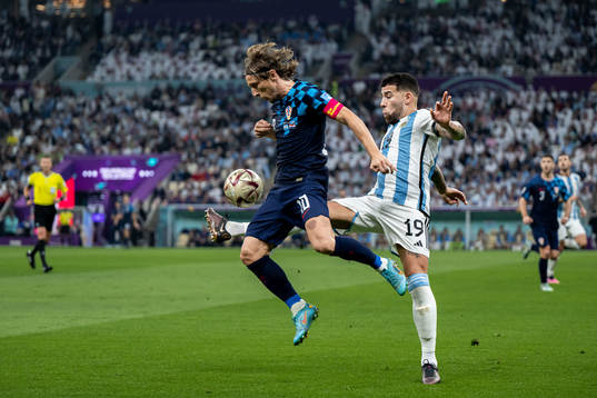 Luka Modric of Croatia and Nicolas Otamendi of Argentina