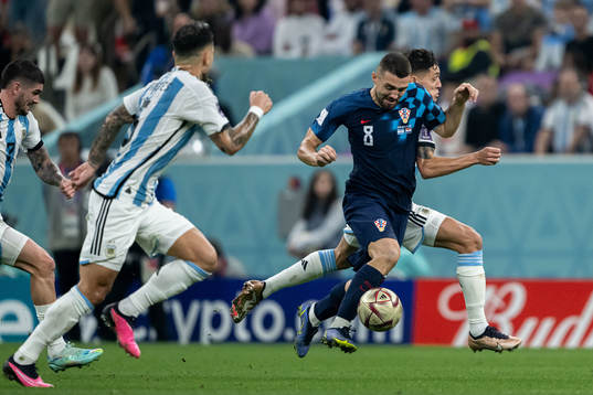 Mateo Kovacic of Croatia and Nahuel Molina of Argentina