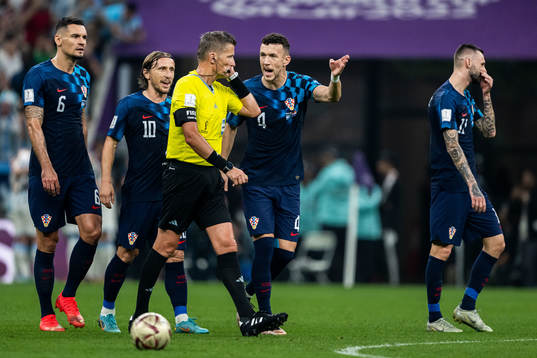 Dejan Lovren, Luka Modric and Ivan Perisic of Croatia and