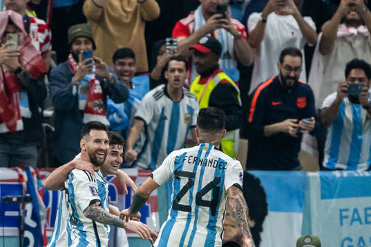 Julian Alvarez of Argentina celebrate with Lionel Messi