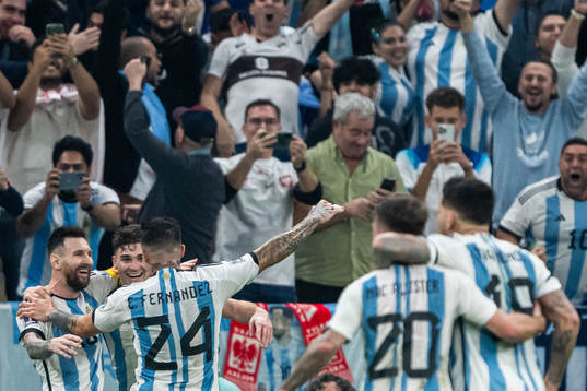 Julian Alvarez of Argentina celebrate with Lionel Messi