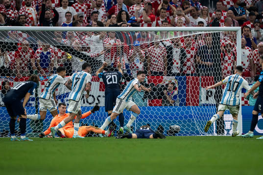 Julian Alvarez of Argentina celebrate with Lionel Messi