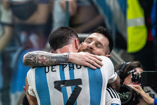 Rodrigo de Paul and Lionel Messi of Argentina celebrate the