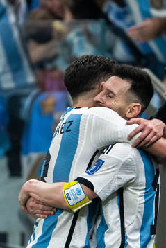 Julian Alvarez and Lionel Messi of Argentina celebrate the