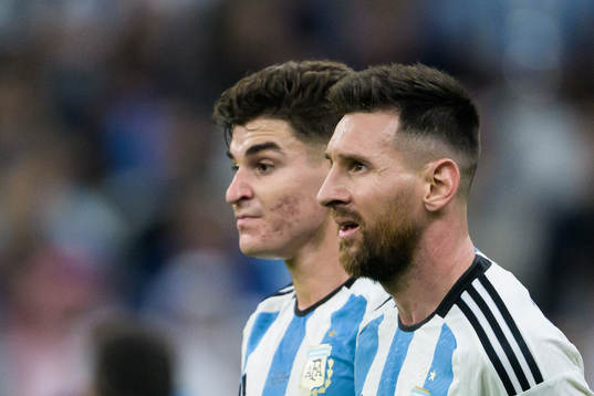 Julian Alvarez and Lionel Messi of Argentina