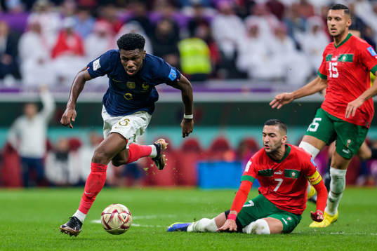 Aurelien Tchouameni of France and Hakim Ziyech of Morocco