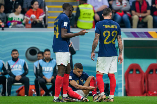 Kylian Mbappe of France with broken shoes