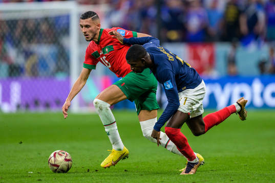 Selim Amallah of Morocco anf Ousmane Dembele of France