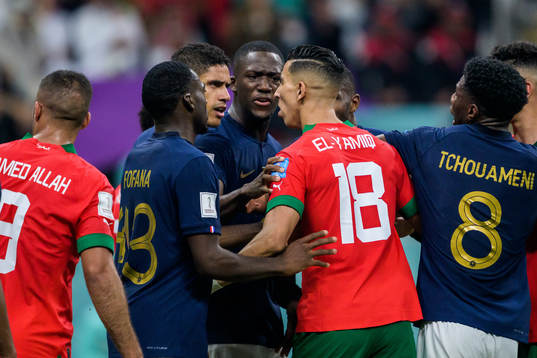 Raphael Varane of France and Jawad El Yamiq of Morocco in a