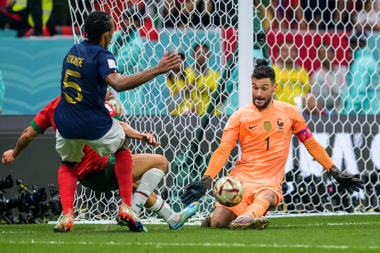 Jules Kounde and goalkeeper Hugo Lloris of France against