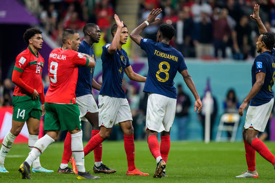 Raphael Varane and Aurelien Tchouameni of France celebrate