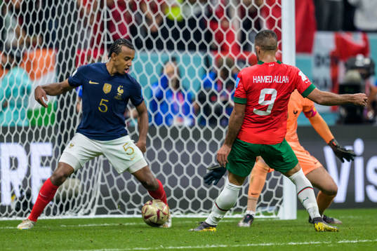 Jules Kounde of France and Abderrazak Hamdallah of Morocco